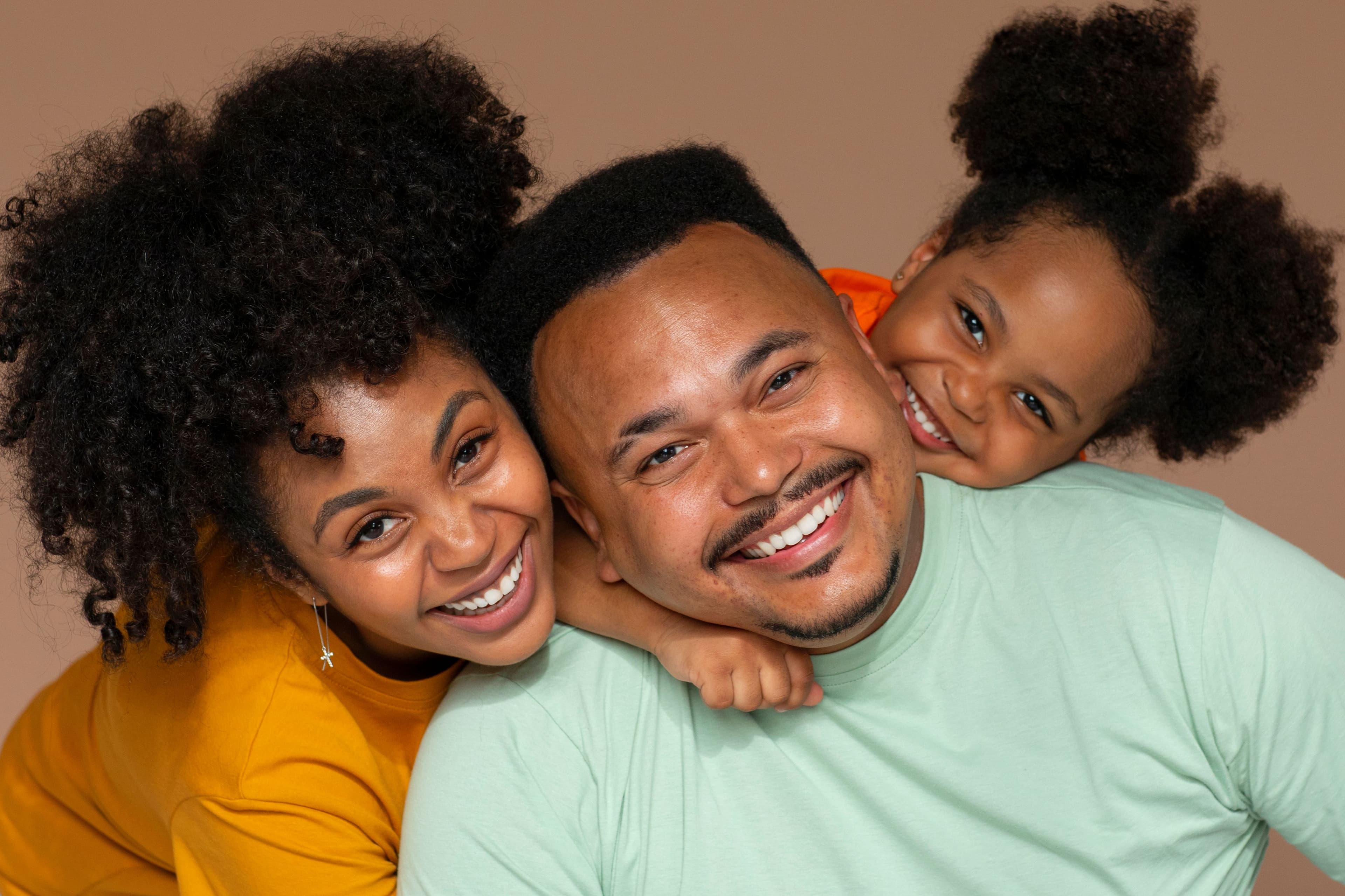 Smiling parents with their child